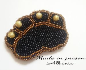 Made in Prison Albania paw bead brooch