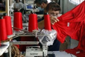 Woman working in a T-Shirt Manufacturing factory